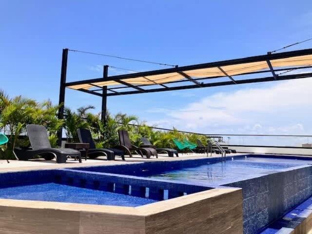Master With Rooftop Pool And Gym Wifi Free Parking Near Apartamento Playa del Carmen